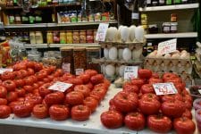 a display in a grocery store filled with lots of fresh produce